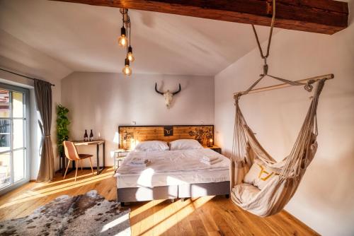 Postel nebo postele na pokoji v ubytování Pivní Hotel