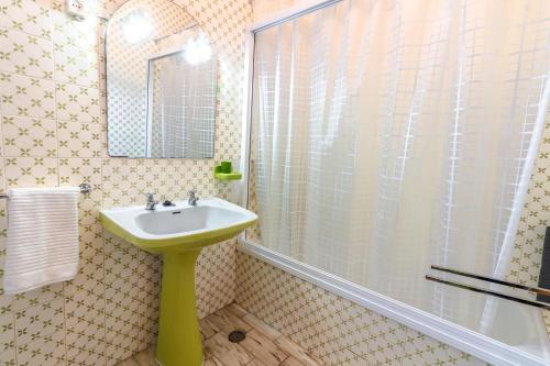 a bathroom with a sink and a shower at Villa 300m from Beach - By Algarkasa in Albufeira