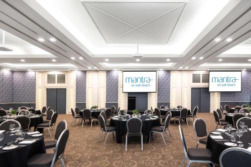 a rendering of a banquet hall with tables and chairs at Mantra on Salt Beach in Kingscliff