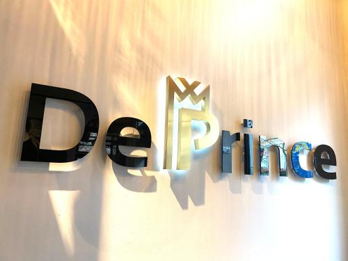 a sign for the new dance line on a wall at Hotel de Prince in Nijmegen