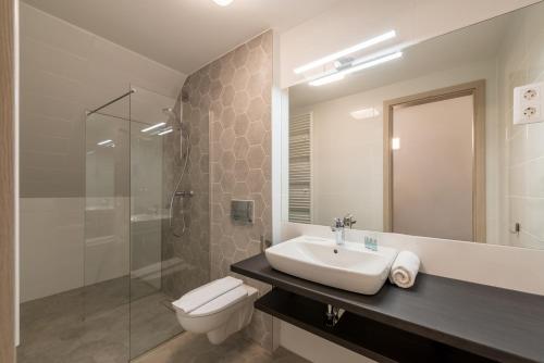 Salle de bains dans l'établissement Fibula Residence Hotel & Wellness - Adults Only