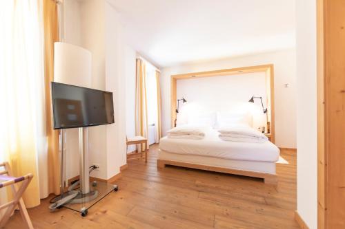 Hotel Müller - mountain lodgeにあるベッド