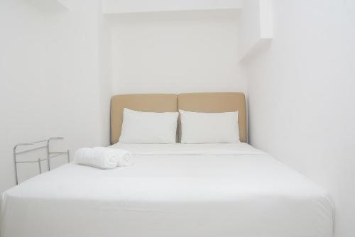 Minimalist and Stylish 1BR Bassura City Apartment By Travelio