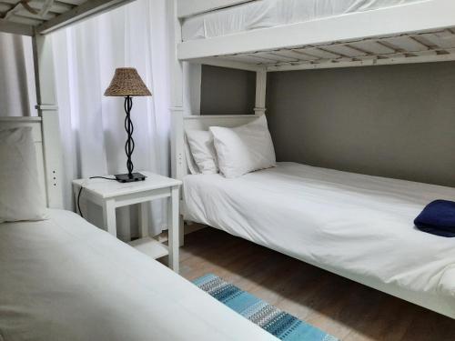 Ένα ή περισσότερα κρεβάτια σε δωμάτιο στο Mseni Beach Lodge