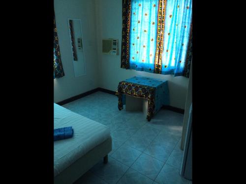 Ένα ή περισσότερα κρεβάτια σε δωμάτιο στο Anns Guesthouse BakauGambia