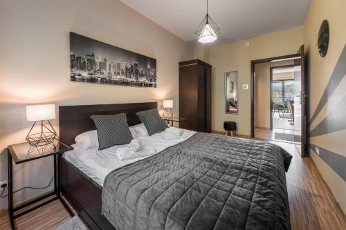 Posteľ alebo postele v izbe v ubytovaní VIP Apartamenty Szklane Domy The View