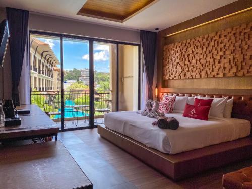 Voodi või voodid majutusasutuse Aurico Kata Resort & Spa - SHA Extra Plus toas