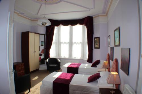 Postel nebo postele na pokoji v ubytování Filton Guest House