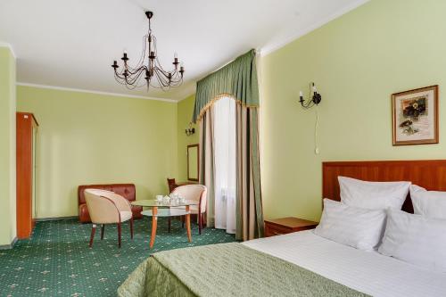 Posteľ alebo postele v izbe v ubytovaní Kolomenskoye Hotel