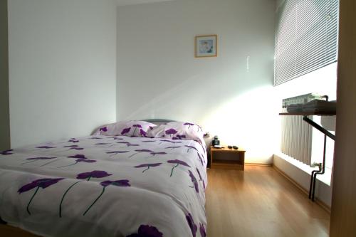 Posteľ alebo postele v izbe v ubytovaní Guest House Ivac Inn Zagreb Airport
