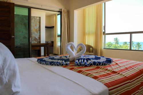 Postel nebo postele na pokoji v ubytování Auroza Resort