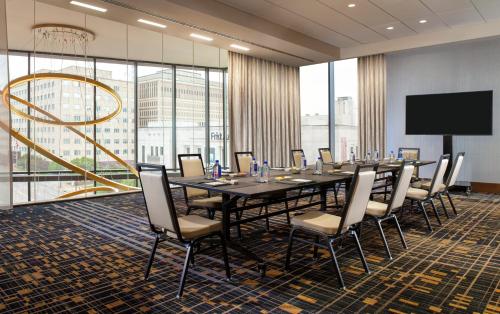a conference room with a long table and chairs at Grand Hyatt Nashville in Nashville