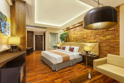 Säng eller sängar i ett rum på Sterling Palm Bliss - Rishikesh
