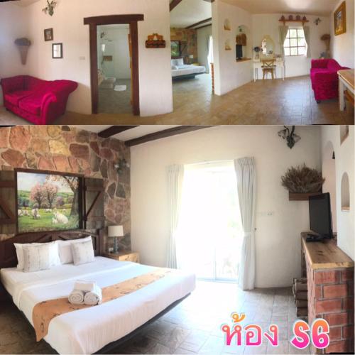 a bedroom with a large bed and a room with a stone wall at Swiss Hotel Pattaya in Sattahip