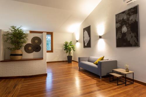 a living room with a couch and a table at Soraluze Hotela in Oñate