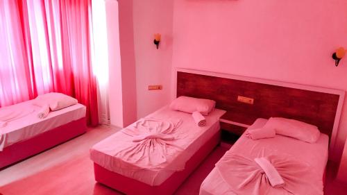 Postel nebo postele na pokoji v ubytování Best Alanya Hotel