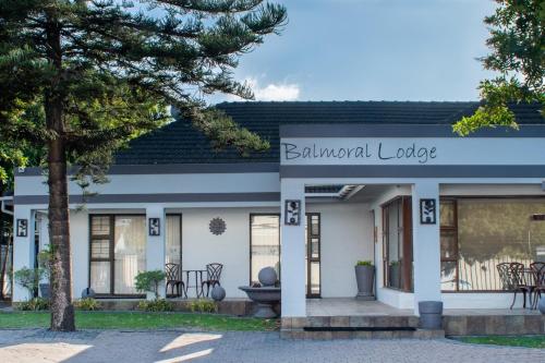 a building with a sign that reads banquet lodge at Balmoral Lodge in Bellville
