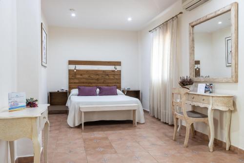 Postel nebo postele na pokoji v ubytování Puerta de Algadir