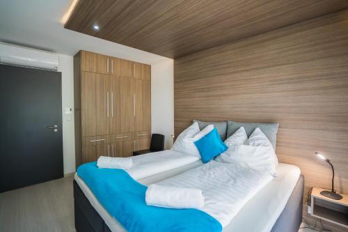 Posteľ alebo postele v izbe v ubytovaní MyFlat B-Lake Silver Apartment