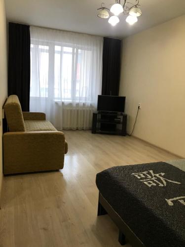 Predel za sedenje v nastanitvi Apartments in Kirov Orlovskaya 4