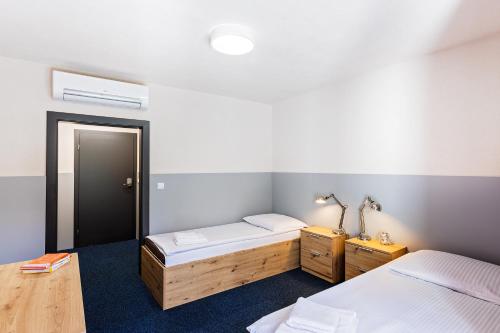 Postel nebo postele na pokoji v ubytování Oblacka Przystań