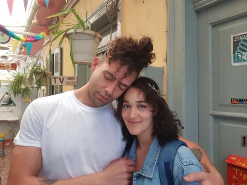a man and a woman posing for a picture at Pagration Youth Hostel in Athens