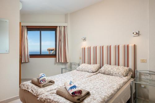 Postel nebo postele na pokoji v ubytování Sunset two bedroom suite