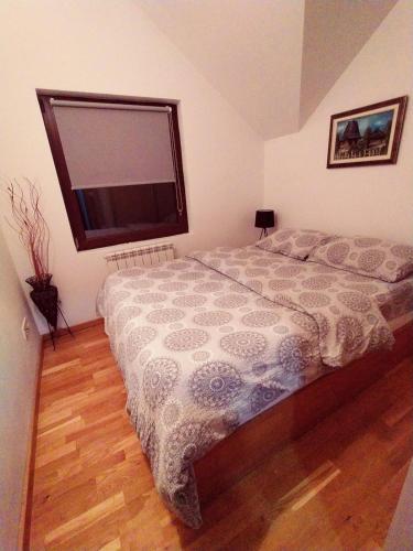 Cama o camas de una habitación en Apartment Gledovic