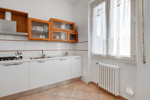 GuestHost - Lulli Cozy Apartment with Balcony