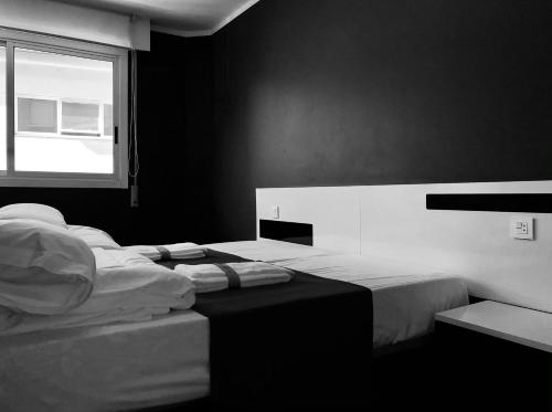 Cama o camas de una habitación en TorrenteBallester6 BY Vigovacaciones