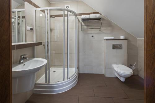 Kúpeľňa v ubytovaní Hotel Zalesie