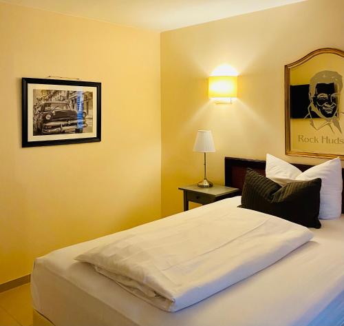 Ένα ή περισσότερα κρεβάτια σε δωμάτιο στο Park Apart Hotel Gatower Str.