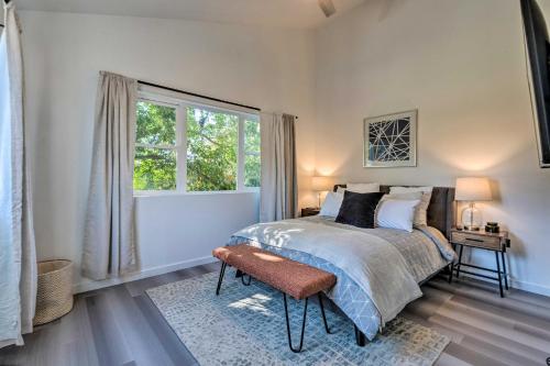 a bedroom with a bed and a window at Modern Midtown Haven with Garage Mt Rose Day Trips! in Reno