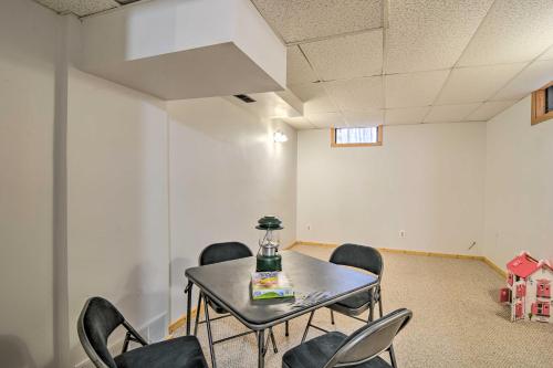 a meeting room with a table and chairs at Family Escape - Near Little Traverse Wheelway in Harbor Springs