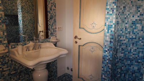 Ett badrum på Guest House de vita beata