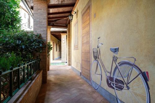 a bike leaning against a wall next to a building at Hotel Santa Maria in Rome