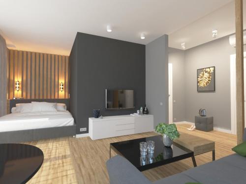 een slaapkamer met een bed en een tv aan de muur bij Zbruch Palace Hotel 