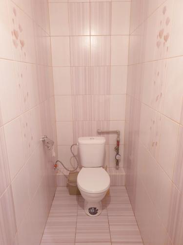 Ett badrum på Apartment on Chornovola, 44