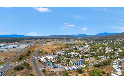 an aerial view of a city with a parking lot at Discovery Parks - Townsville in Townsville