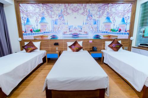 Un ou plusieurs lits dans un hébergement de l'établissement SAKURA HOTEL