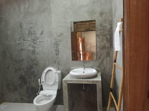 Koupelna v ubytování Watukarung Ristu Homestay