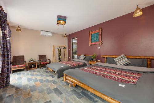 a bedroom with two beds in a room at Mega View Homestay in Sa Pa