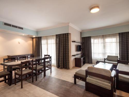 Postel nebo postele na pokoji v ubytování Sunny Days Mirette Family Resort