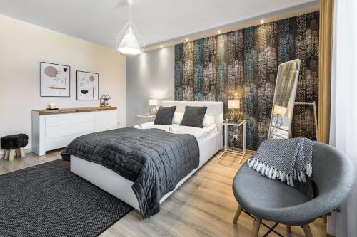 Posteľ alebo postele v izbe v ubytovaní VIP Apartamenty Centrum Przy Równi