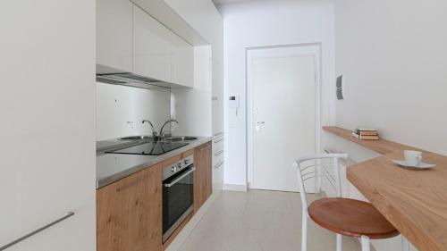 Η κουζίνα ή μικρή κουζίνα στο Rivazzurra Homes - C