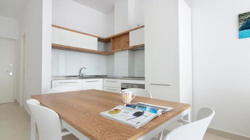 Η κουζίνα ή μικρή κουζίνα στο Rivazzurra Homes - C