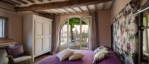 Posteľ alebo postele v izbe v ubytovaní Villa Tinaia - Homelike Villas