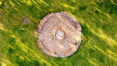 an overhead view of a wooden circle in the middle of a field at Rest at Chabivin in Stellenbosch
