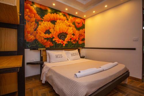 Ένα ή περισσότερα κρεβάτια σε δωμάτιο στο Hotel Legjenda