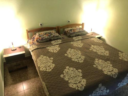 A bed or beds in a room at Hostel Bukhara Gold
